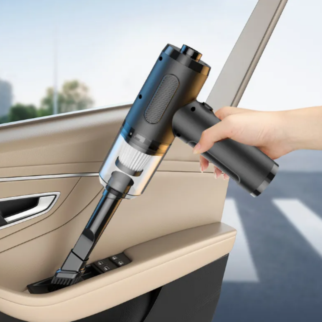 A cordless vacuum cleaner being used to clean a car interior.